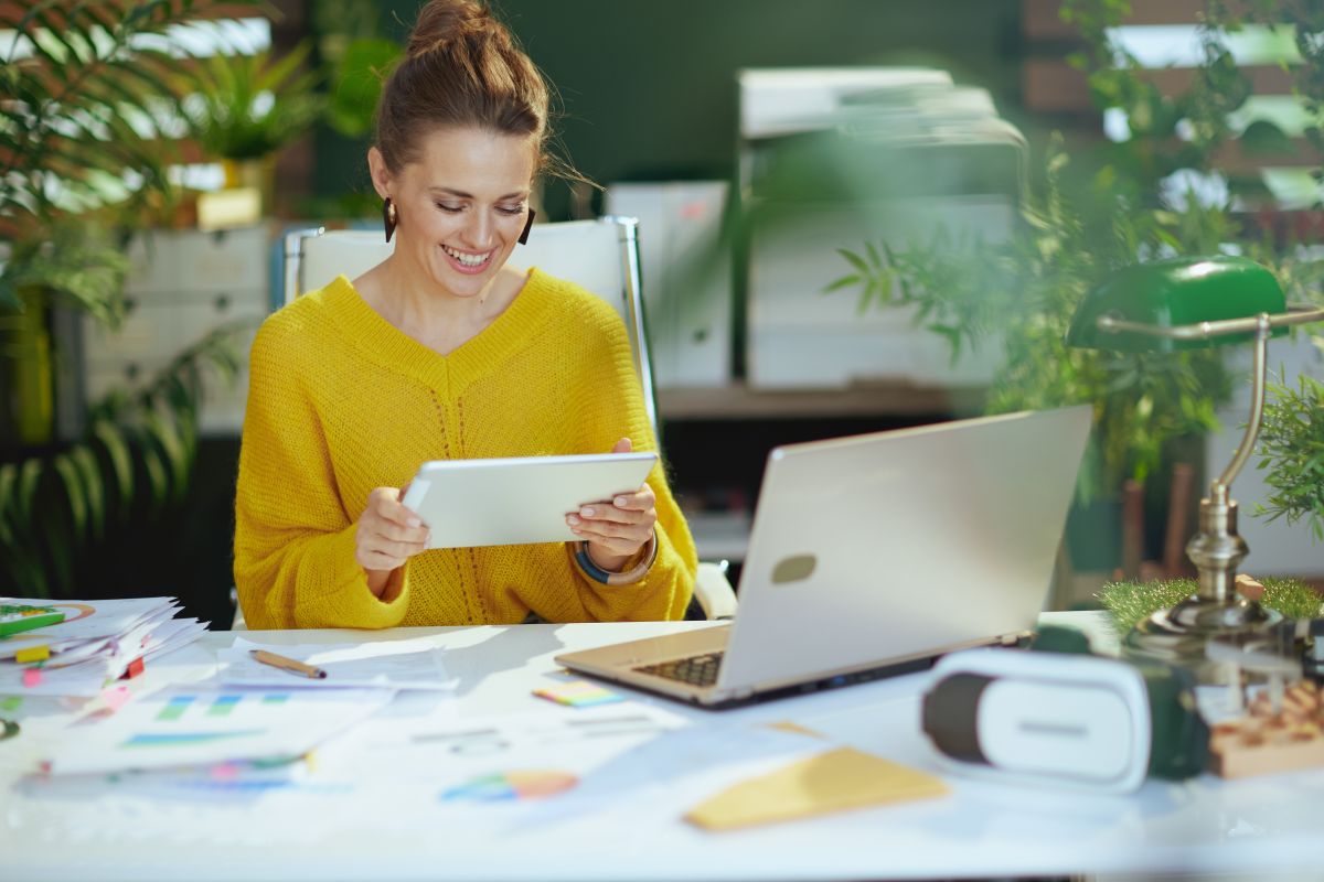 Happy,Modern,Small,Business,Owner,Woman,In,Yellow,Sweater,With